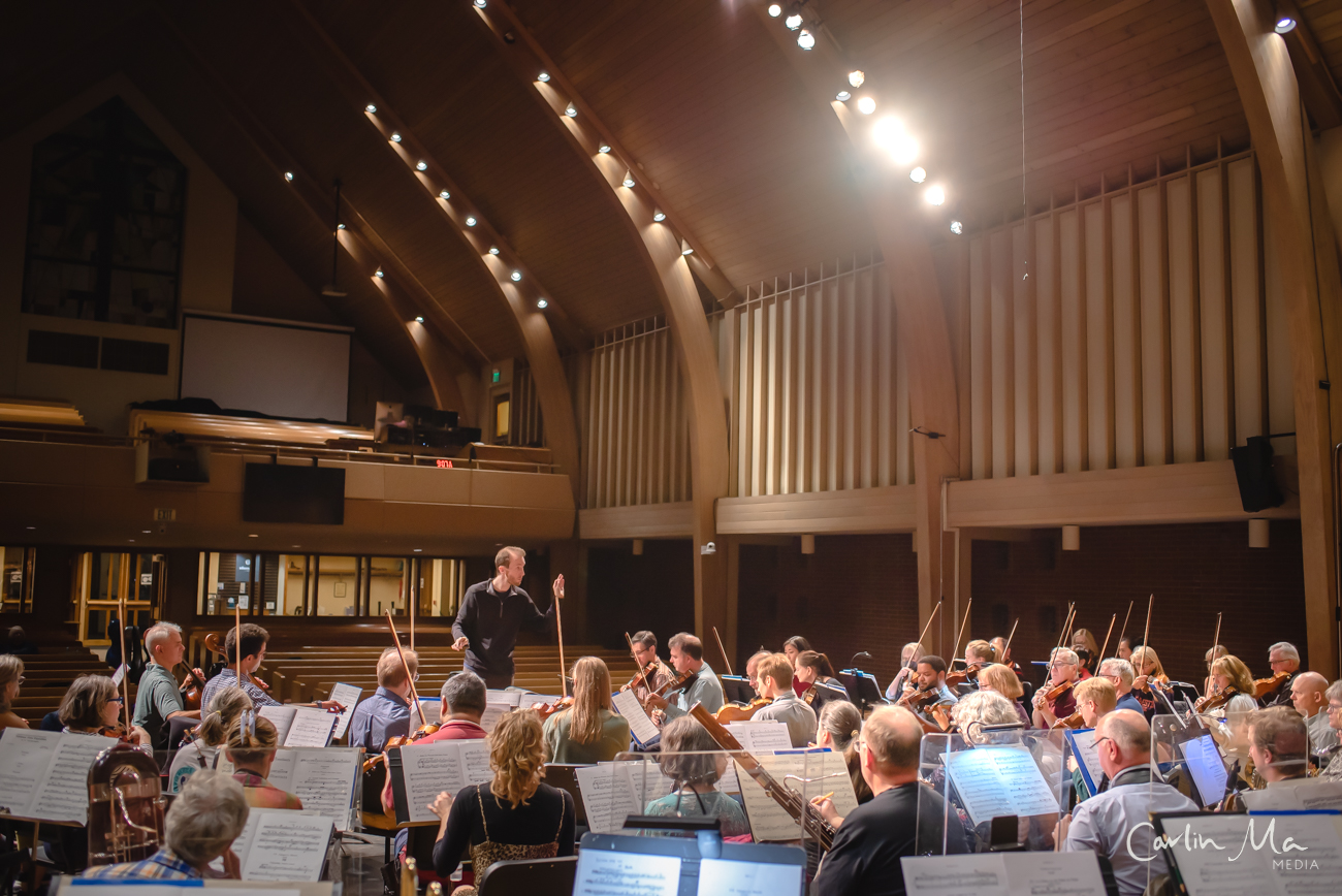 William White conducts Harmonia in rehearsal